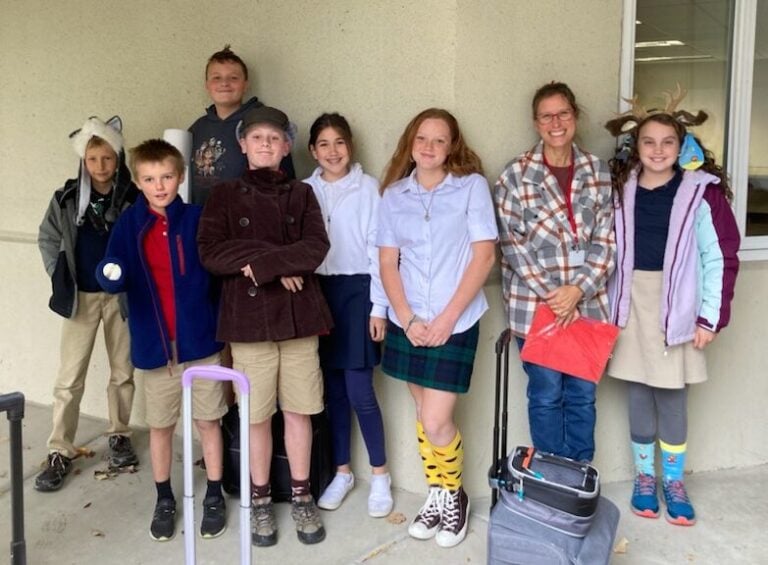 Students in front of school